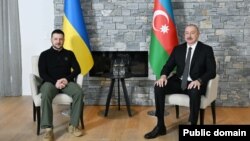 İlham Əliyev və Volodimir Zelenski Davos şəhərində keçirilən iqtisadi forumda. 22 yanvar, 2025-ci il.