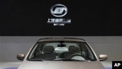 A new Baojun 630 sedan is displayed at the Shanghai International Auto Show Thursday, April 21, 2011 in Shanghai, China.