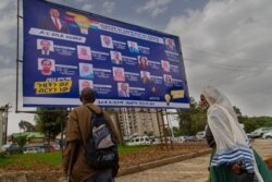 A billboard for the ruling party, led by Prime Minister Abiy Ahmed, who is expected to retain his seat after the elections, is seen in Addis Ababa, Ethiopia, June 16, 2021. (VOA/Yan Boechat)