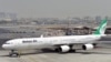 FILE - A picture taken on September 14, 2017 shows an Airbus A340 of Mahan Air at the tarmac at Dubai's International Airport.