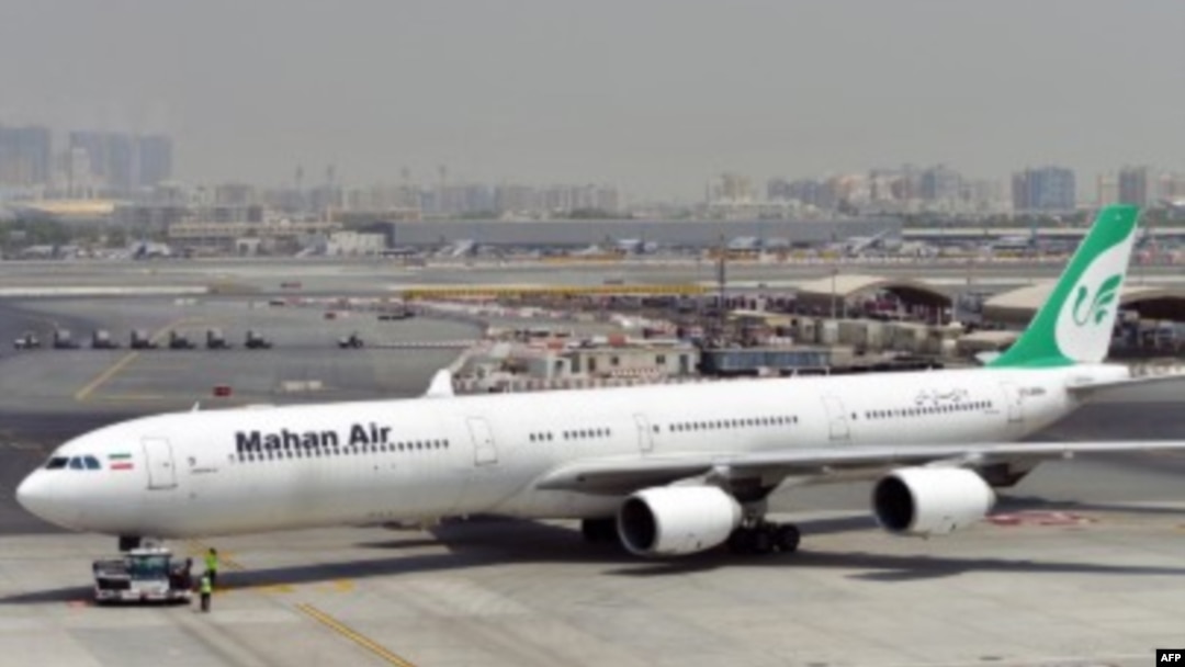 FILE - A picture taken on September 14, 2017, shows an Airbus A340 of Mahan Air at the tarmac at Dubai's International Airport.