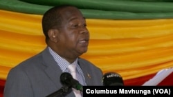 Mthuli Ncube, Zimbabwe’s finance minister, talks to reporters and diplomats in October 2024 in Harare, Zimbabwe.