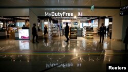 FILE - A duty-free shop inside the new satellite facility for Munich Airport's Terminal 2, southern Germany, April 22, 2016. 