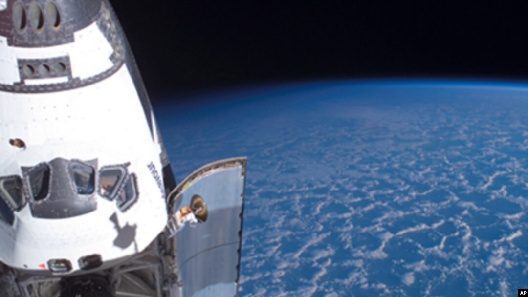 The Space Shuttle Endeavour is docked to the International Space Station during its final mission to space.
