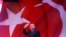 FILE - Turkish President Recep Tayyip Erdogan greets his supporters in Istanbul, Turkey, April 12, 2017. 