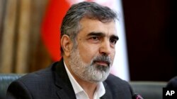 Spokesman for Iran's atomic agency Behrouz Kamalvandi speaks in a press briefing in Tehran, Iran, Sunday, July 7, 2019. Iran's deputy foreign minister says that his nation considers the 2015 nuclear deal with world powers to be a "valid document"…