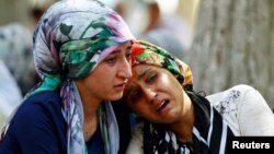 Women mourn in the Turkish city of Gaziantep after a suicide bomber killed more than 50 people at a wedding party on Aug. 21, 2016.