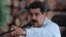 Venezuela's President Nicolas Maduro speaks during a visit to an industrial sawmill in Chaguaramas, Venezuela, Aug. 18, 2016. (Miraflores Palace/Handout)