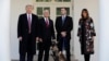 President Donald Trump, Vice President Mike Pence and First Lady Melania Trump present Conan, the military working dog injured in the successful operation targeting Islamic State leader Abu Bakr al-Baghdadi, before the media in the Rose Garden at the White House in Washington.