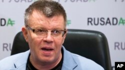 FILE - Nikita Kamaev, managing director of Russian anti-doping agency (RUSADA), talks to reporters at the agency headquarters in Moscow, Nov. 10, 2015.