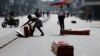 Caskets, dropped by protesters, lie on the road during a demonstration over police killings of people protesting tax increases, in Nairobi, Kenya, July 2, 2024.