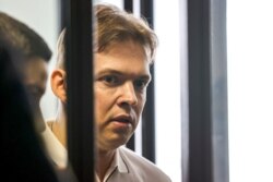 FILE - Maxim Znak, attends a court hearing in Minsk, Belarus, Aug. 4, 2021.