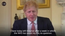 FILE - A grab done from the Twitter page of Britain's Prime Minister Boris Johnson, in which he hails the staff in the National Health Service (NHS) for saving his life, filmed at 10 Downing Street, London, April 12, 2020.