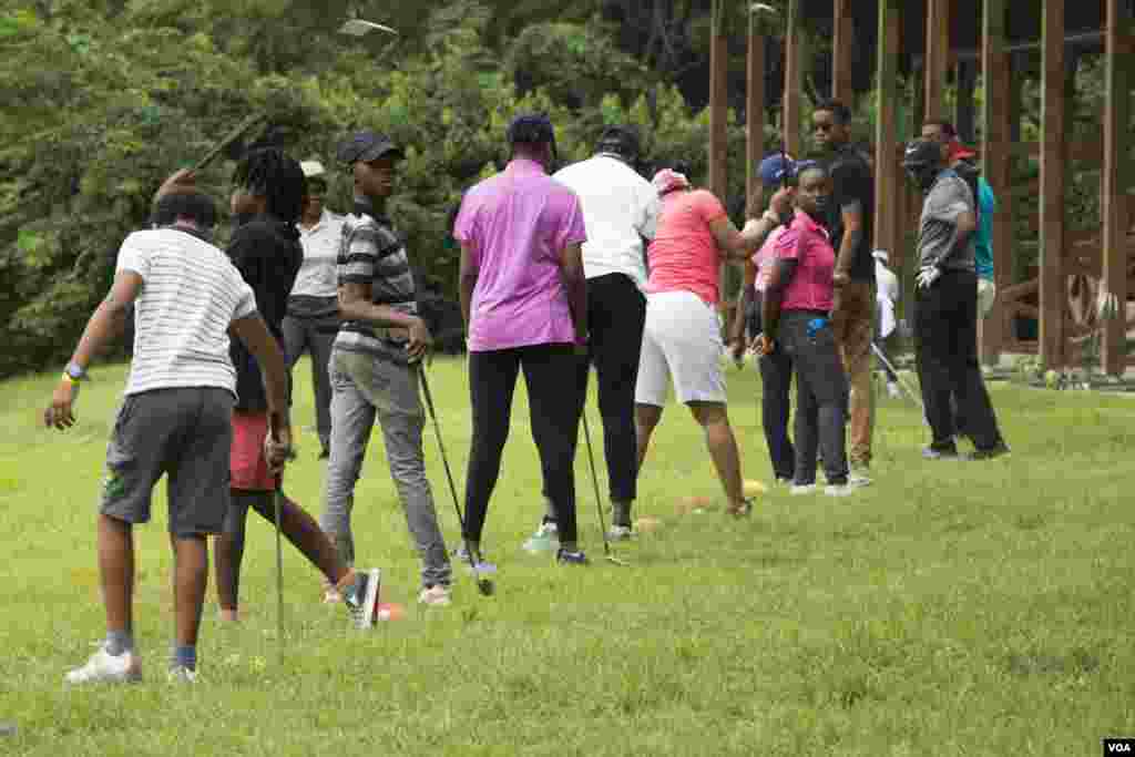 Golf is slowly gaining popularity in Nigeria. Every Saturday, young people take lessons at the IBB International Golf and Country Club in the Nigerian capital of Abuja. Uloma Mbuko is the lead instructor. (Chika Oduah for VOA)