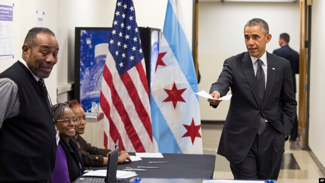 Tổng thống Barack Obama đến bỏ phiếu sớm tại Trung tâm Dịch vụ Cộng đồng Martin Luther King ở Chicago 20/10/14