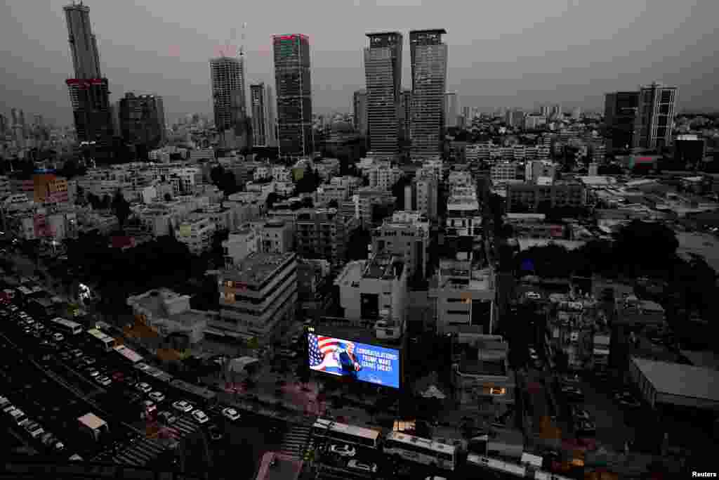 Republican presidential nominee and former U.S. President Donald Trump appears on a congratulatory billboard for the 2024 U.S Presidential Election, in Tel Aviv, Israel, Nov. 6, 2024.