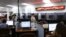 People use computers to look for work at WorkForce One in Hollywood, Florida, August 1, 2012.