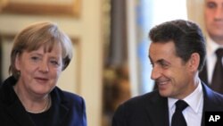 ပြင်သစ်သမ္မတ Nicolas Sarkozy နဲ့ ဂျာမဏီဝန်ကြီးချုပ် Angela Merkel