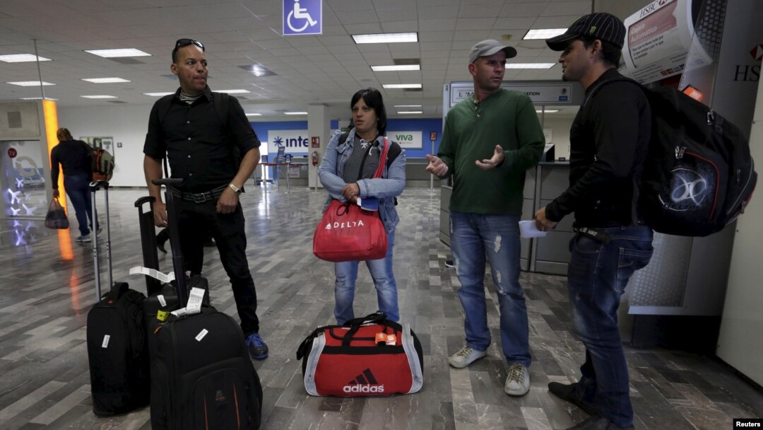 Cuban migrants arrive after traveling en route from Costa Rica to El Salvador, Guatemala and Mexico, before heading to the U.S., at General Lucio Blanco International airport in Reynosa, in Tamaulipas state, Mexico, Jan. 17, 2016. 