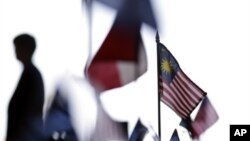 A Malaysian flag among other flags at the Trans-Pacific Partnership Free Trade Agreement talks, San Diego, July 10, 2012.