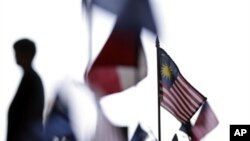 A Malaysian flag among other flags at the Trans-Pacific Partnership Free Trade Agreement talks, San Diego, July 10, 2012.