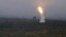 An air defense missile system flies during a military exercises on training ground "Telemba," about 80 kilometers (50 miles ) north of the city of Chita during the military exercises Vostok 2018 in Eastern Siberia, Russia, Sept. 12, 2018. 