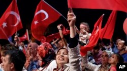 Turkey Military Coup: Supporters of Turkish president Recep Tayyip Erdogan wave Turkish flags during an anti coup rally at Taksim square in central Istanbul, on Sunday, July 31, 2016. 
