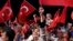 Turkey Military Coup: Supporters of Turkish president Recep Tayyip Erdogan wave Turkish flags during an anti coup rally at Taksim square in central Istanbul, on Sunday, July 31, 2016. 