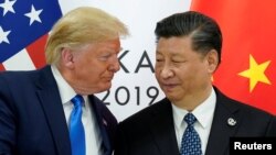 အမေရိကန်သမ္မတ ဒေါ်နယ်လ်ဒ် ထရမ့်ပ် နှင့် တရုတ်သမ္မတ  Xi Jinping တို့ ၂၀၁၉ ဇွန်လတွင် တွေ့ဆုံစဉ်