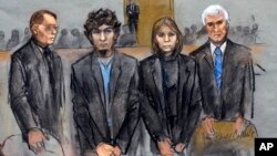 In this courtroom sketch, Dzhokhar Tsarnaev (2nd from Left) is depicted standing with his defense attorneys William Fick (L) Judy Clarke (2nd from R), and David Bruck (R) as the jury presents its verdict in his federal death penalty trial, April 8, 2015, 