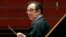 FILE - Chief conductor Charles Dutoit rehearses with the Philadelphia Orchestra in Philadelphia, Oct. 19, 2011.