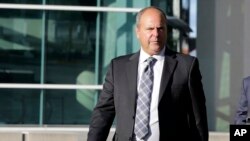 FILE - In this Feb. 1, 2017, file photo, sports agent Bartolo Hernandez leaves federal court in Miami. 