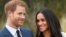 Britain's Prince Harry poses with Meghan Markle in the Sunken Garden of Kensington Palace, London, Britain, Nov. 27, 2017. 