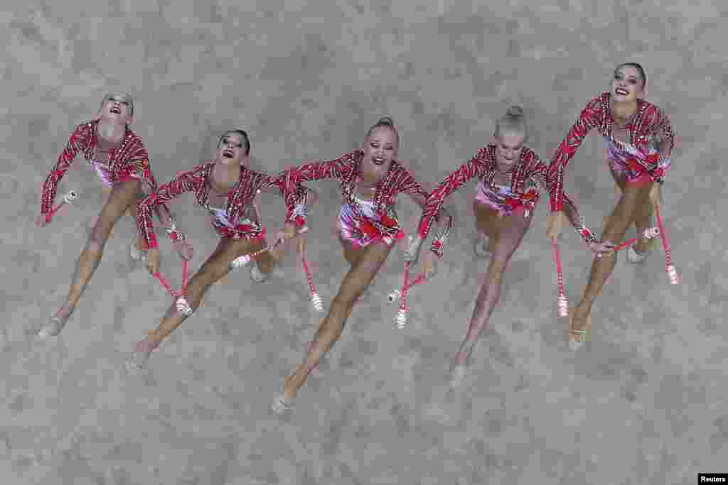 Russia&#39;s team competes during the rhythmic gymnastics group all-around final match at the 2014 Nanjing Youth Olympic Games in Nanjing, Jiangsu province, China.