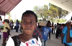 This woman standing in line for an ID card in Port-au-Prince, Haiti, on April 1, 2020, complained that the government breaks its own COVID-19 rules.