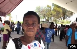 This woman standing in line for an ID card in Port-au-Prince, Haiti, on April 1, 2020, complained that the government breaks its own COVID-19 rules.