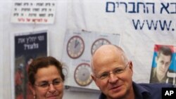 The parents of captured Israeli soldier Gilad Shalit are seen at a protest tent outside the residence of Israel's PM Netanyahu in Jerusalem
12/10/2011