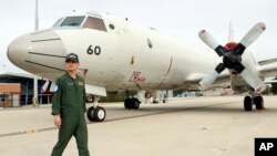 4일 호주 남서부 퍼스 공군기지에서 일본 항공자위대 소속 P-3C 초계기가 말레이시아 실종 여객기 수색 작업에 참가하기 위해 준비 중이다.