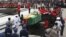 The coffin of the late Ghanaian President John Atta Mills is transported in Accra, Ghana, August 10, 2012.