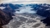 FILE - The melting Sermeq glacier, located around 80 km south of Nuuk, is photographed in this aerial over Greenland, Sept. 11, 2021. 