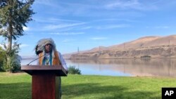 JoDe Goudy, chairman of the Yakama Nation, speaks with the Columbia River in the background near The Dalles, Oregon, Oct. 14, 2019.