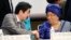 Japanese Prime Minister Shinzo Abe, left, shakes hands with Liberian President Ellen Johnson Sirleaf at a symposium on human security held on the sidelines of the Tokyo International Conference on African Development in Yokohama, Japan, Jun. 2, 2013.