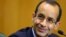 FILE - Marcelo Odebrecht, then the head of Latin America's largest engineering and construction company Odebrecht SA, smiles as he gives his testimony in a session of the Parliamentary Committee of Inquiry in Curitiba, Brazil, September 1, 2015.