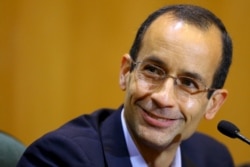 FILE - Marcelo Odebrecht, then the head of Latin America's largest engineering and construction company Odebrecht SA, smiles as he gives his testimony in a session of the Parliamentary Committee of Inquiry in Curitiba, Brazil, Sept. 1, 2015.