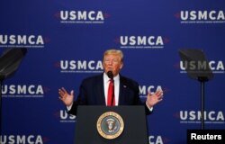 FILE - U.S. President Donald Trump delivers remarks on supporting the passage of the U.S.-Mexico-Canada (USMCA) trade deal during a visit to Milwaukee, Wisconsin, July 12, 2019.