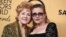 Debbie Reynolds, winner of the Screen Actors Guild lifetime award, left, and Carrie Fisher pose in the press room at the 21st annual Screen Actors Guild Awards at the Shrine Auditorium, Jan. 25, 2015, in Los Angeles. 