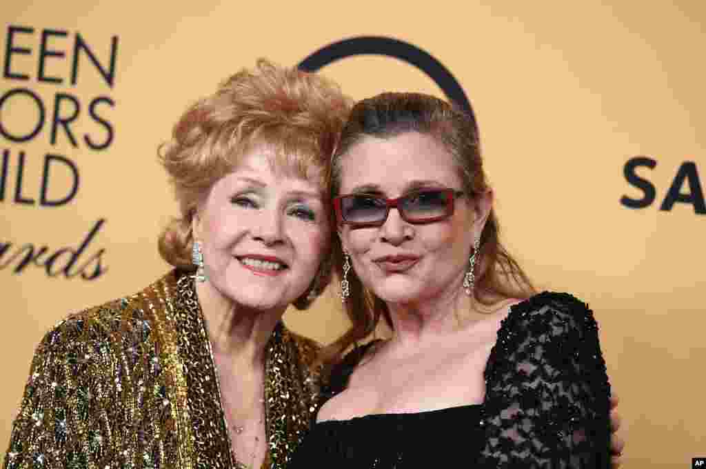 U.S. film actress Debbie Reynolds, 84, (left), died, Dec. 28, 2016, after suffering a stroke, one day after her film star daughter, Carrie Fisher, (right) died of a heart attack.&nbsp;