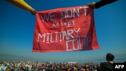 Protesters take part in a demonstration against the Myanmar military coup in Inle lake, Shan state, Myanmar, Feb. 11, 2021. 