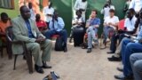 Oliver Modi, left, of the Union of Journalists of South Sudan attends a meeting in Juba on the killing of Peter Moi of The New Nation newspaper, Aug. 21, 2015. Days earlier, President Salva Kiir threatened to kill journalists who reported "against the country."