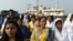 Indian women leave after visiting the inner sanctum of the Haji Ali Dargah in Mumbai, Nov. 29, 2016.
